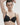 French moulded black t-shirt bra with seamless contour cups, plunge neckline, and multi-way straps in soft microfiber for invisible support.