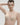 French moulded rose t-shirt bra with seamless contour cups, plunge neckline, and multi-way straps in soft microfiber for invisible support.