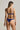 back view of model wearing the Venetian Glass balconette bra in blue with adjustable straps and band closure