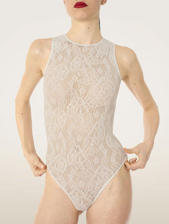 Wolford Infinite Rose Net String Body in cream, featuring a seamless sleeveless round neckline, sheer floral warp knit net, thong back, and cotton gusset with snap closure.