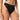 Black Anemone thong with floral lace and silky microfiber, mid-rise fit for smooth, invisible comfort under clothing.