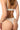 Ivory Anemone thong with floral lace and silky microfiber, mid-rise fit for smooth, invisible comfort under clothing.
