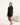 Black bamboo T-shirt with side seams and cuts, thermoregulating and eco-friendly for breathable, stylish loungewear or layering.