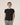Black bamboo T-shirt with side seams and cuts, thermoregulating and eco-friendly for breathable, stylish loungewear or layering.