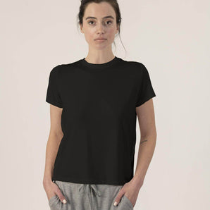 Black bamboo T-shirt with side seams and cuts, thermoregulating and eco-friendly for breathable, stylish loungewear or layering.