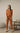 Burnt orange joggers with drawstring waistband and banded cuffs