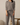 Model wearing full Aspen Dream Cozy Banded Joggers in taupe.