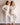 Two models wearing cozy V-neck top and banded joggers in beige Cashmere