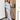 Pale blue wide leg lounge pants with relaxed drape, front view