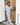 Pale blue wide leg lounge pants with relaxed drape, front view