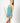 Model wearing cute stitching cami short set in antigua with teal stitching