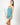 Model wearing cute stitching cami short set in antigua with teal stitching