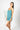 Model wearing cute stitching cami short set in antigua with teal stitching