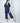 Model wearing Aspen Dream's Jolene Cropped Pajama Set in Navy with short sleeve top and cropped pants