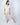 Model wearing Aspen Dream Jolene Cropped Pajama Set in Powder Rose.