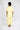 Back view of buttery yellow pajama top and cropped wide-leg pants showing notch collar
