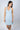 Baby Blue bamboo chemise with lace racerback and sheer lace underbust, offering breathable comfort and chic, body-hugging elegance.