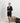 Aspen Dream black short robe with lace panels, pockets, and a sewn-in belt in soft, breathable bamboo fabric.