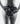 Back detail of the Aubade Mini Coeur Cheeky Love black lace brief with an open back and satin ribbon tie.