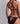Back view of model wearing the Aubade Velvet Snake set showing the triple-ring charm and strappy mini-cœur brief