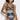 model wearing the Bordelle Siren balconette bra, thong and suspender set with embroidered tulle and gold hardware