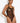 Model wearing the Bordelle Zenna Halter-Neck Body in black featuring sheer Italian mesh, a halter neckline, satin elastic straps, and 24k gold hardware.