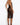 Back view of the Bordelle Zenna sheer mesh pencil skirt styled with the matching halter-neck body in black.