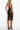 Back view of the Bordelle Zenna sheer mesh pencil skirt styled with the matching halter-neck body in black.