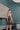 Model wearing Brooke Nightie, lace-up back with scalloped hem