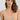 Classic seamless beige sports bra in soft ribbed fabric with light support and smooth fit, perfect for everyday comfort.