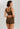 Classic seamless brown sports bra in soft ribbed fabric with light support and smooth fit, perfect for everyday comfort.