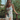 model wearing Clea nightdress by Marjolaine with floral satin and lace trim in white