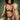 Woman wearing the Coco de Mer Arletta quarter cup bra with matching embroidered thong in emerald green.