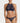 Woman wearing the Coco de Mer Tamara high neck lace bustier with matching Brazilian brief in sapphire blue French Leavers lace.