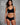 Model wearing a black butter hipster by commando with product features highlighted