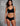 Model wearing a black butter hipster by commando with product features highlighted