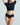 Model wearing a black crop top and high-waisted black Butter Hipster by Commando
