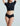 Model wearing a black crop top and high-waisted black Butter Hipster by Commando