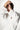 close-up detail of the Dahlia cotton knitted robe in white by Pluto showing the sleeve trim and knit texture