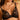 Close-up of floral embroidery and gold-tone strap detail on Desir Et Volupté push-up bra in black.