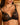 Close-up of floral embroidery and gold-tone strap detail on Desir Et Volupté push-up bra in black.