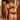 Back view of Desir Et Volupté thong showing scalloped trim, triangle cut-out, and large embroidered motif.