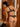 Back view of Desir Et Volupté thong showing scalloped trim, triangle cut-out, and large embroidered motif.