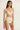 model wearing the Else Bella soft triangle bra in ivory with wireless unlined cups and longline mesh band