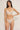 model wearing the Else Bella thong featuring pointelle mesh and a minimalist string waistband in ivory
