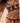 Black silk thong with embroidery on tulle, gold ring details, and silk straps for a sleek, sensual silhouette and luxurious comfort.