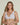 Forte white wireless bralette with French floral lace, plunge neckline, scalloped edges, and soft triangle cups for a bold, feminine look.