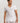 HANRO Cotton Superior Fitted V-Neck T-Shirt in white for men in mercerized Egyptian cotton with a slim fit and broad V-neck, front view.