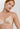 HANRO Satin Deluxe beige soft cup T-shirt bra in silky viscose with plunge neckline, padding, and matte gold hardware.
