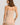 HANRO beige seamless V-neck camisole in mercerized cotton with satin trim and adjustable straps, perfect for layering or wearing alone.